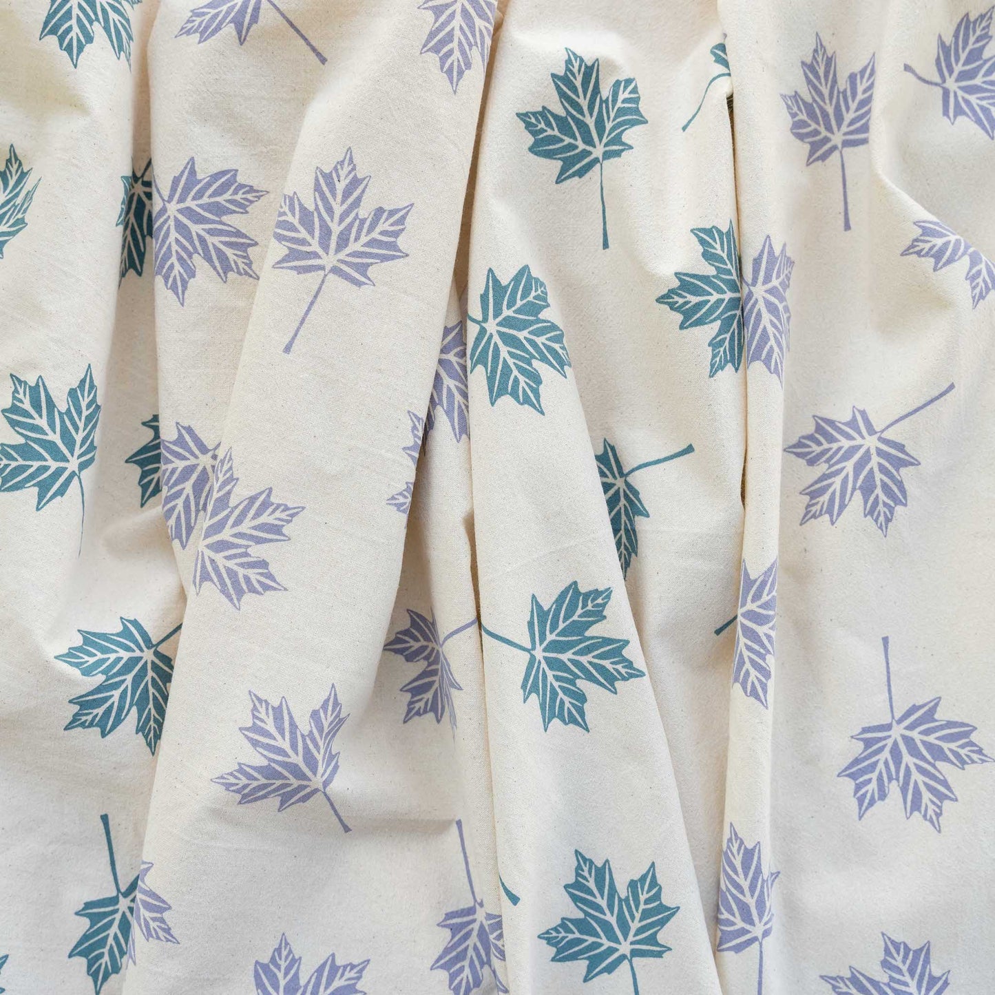 Screen printed maple leaf tea towels on natural cotton