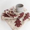 Flour sack cotton oak leaf dish towel with coffee mug