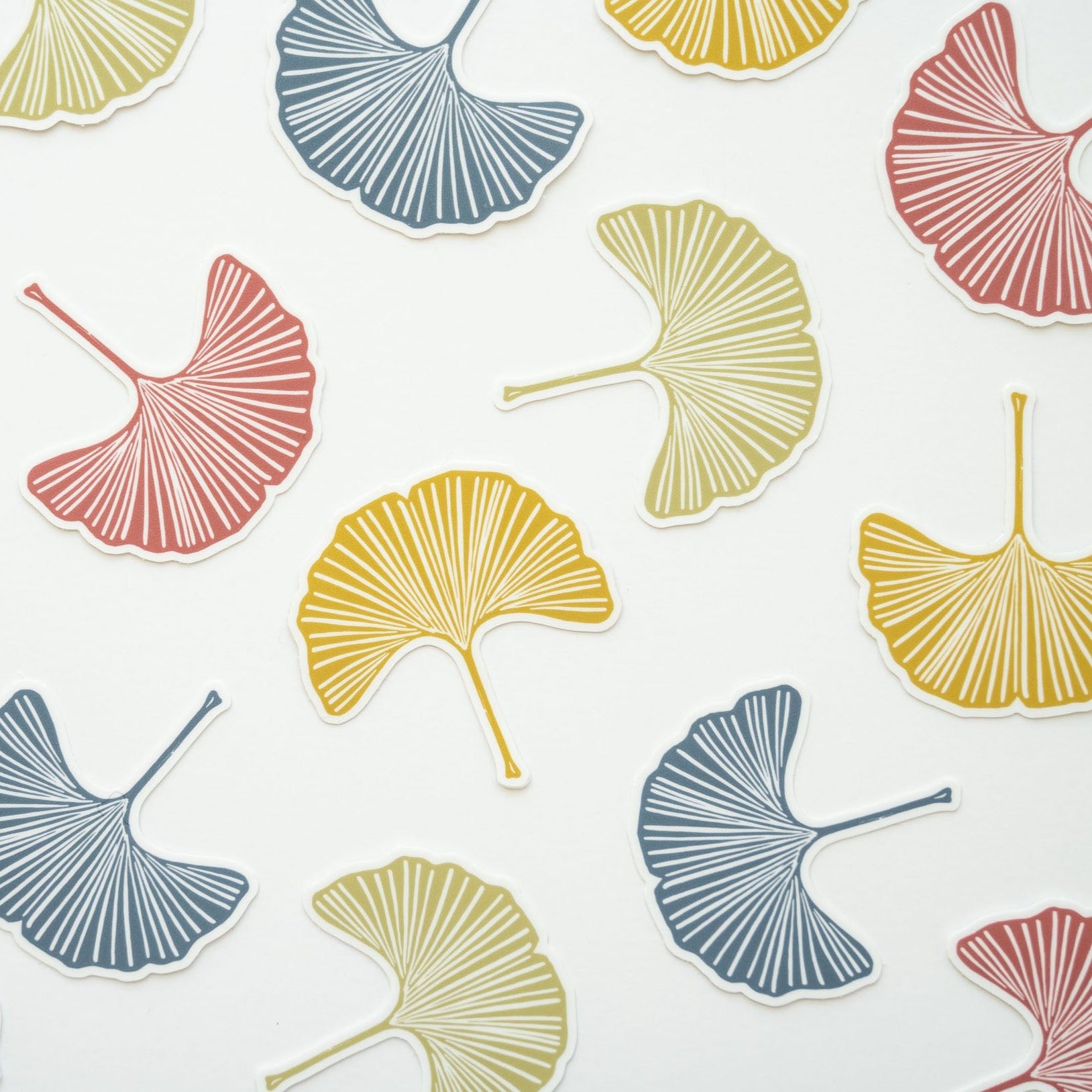 Individually vinyl ginkgo leaf stickers in green, blue, prink, and gold