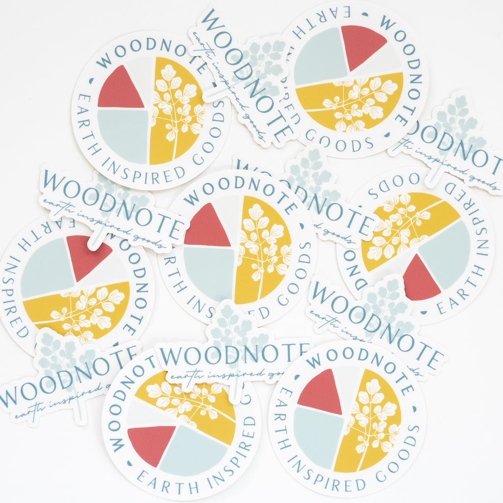 Group of vinyl Woodnote logo stickers