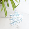Vinyl Woodnote logo stickers on marble